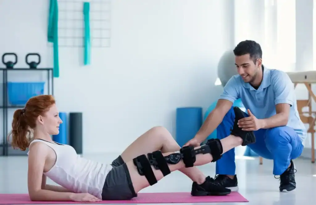 Woman having treatment to help muscle recovery Horley after an injury
