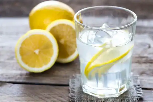 Hydration: The Secret Ingredient for a Toned Stomach and Enhanced Fitness 2 Image of lemon water to aid hydration Horley