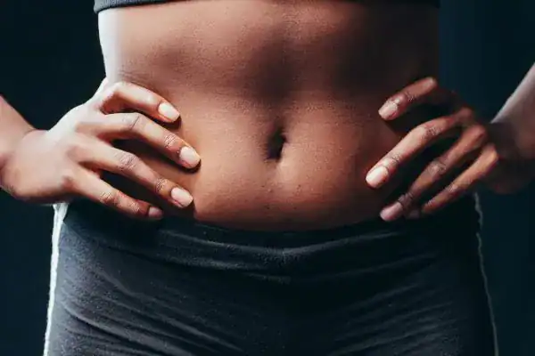 Toning Your Stomach: The Ultimate Guide to Achieving a Sculpted Stomach While Shedding Pounds 1 Image of a toned stomach after non surgical treatment Horley